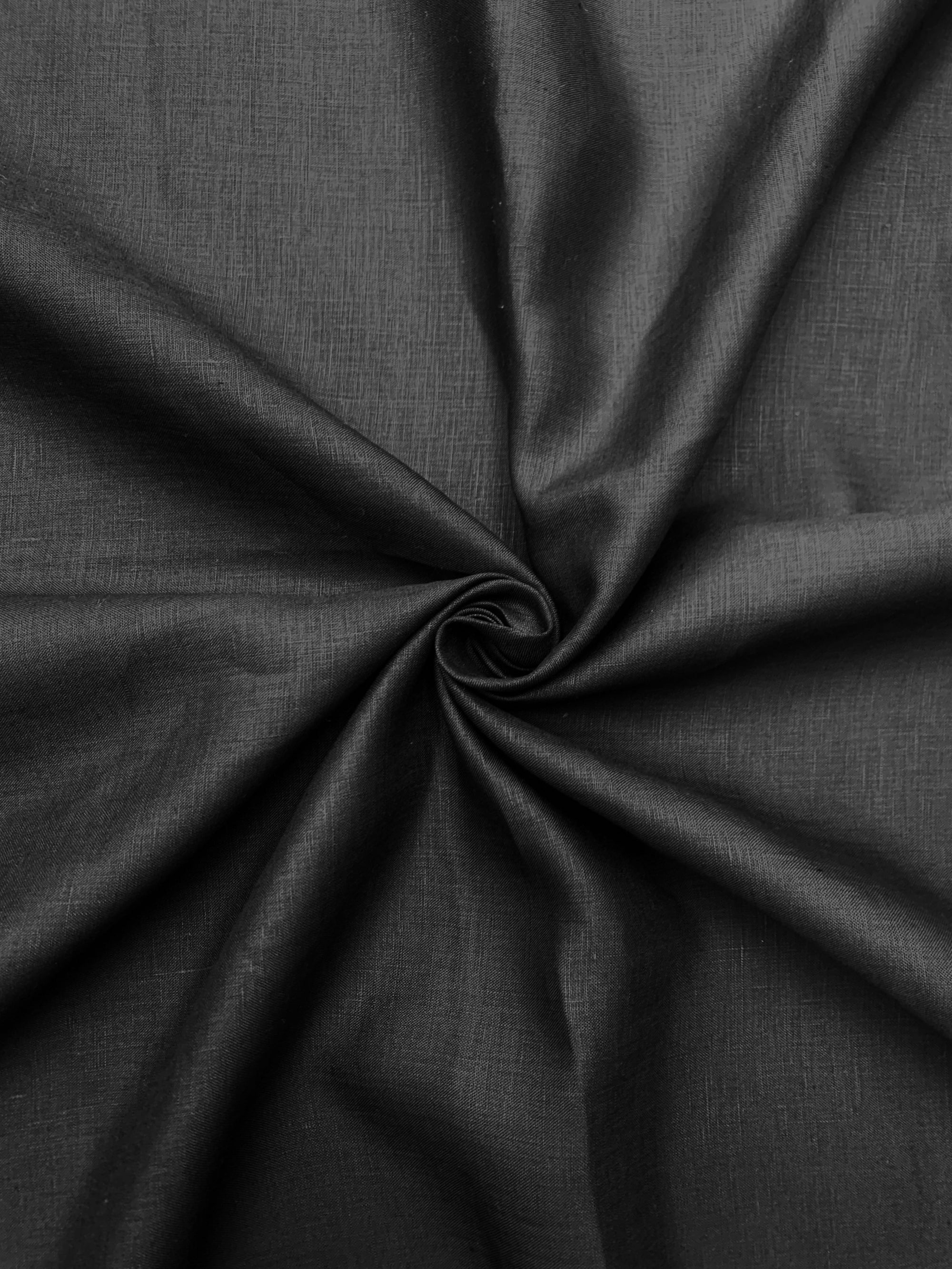 Black linen fabric in a spiral.