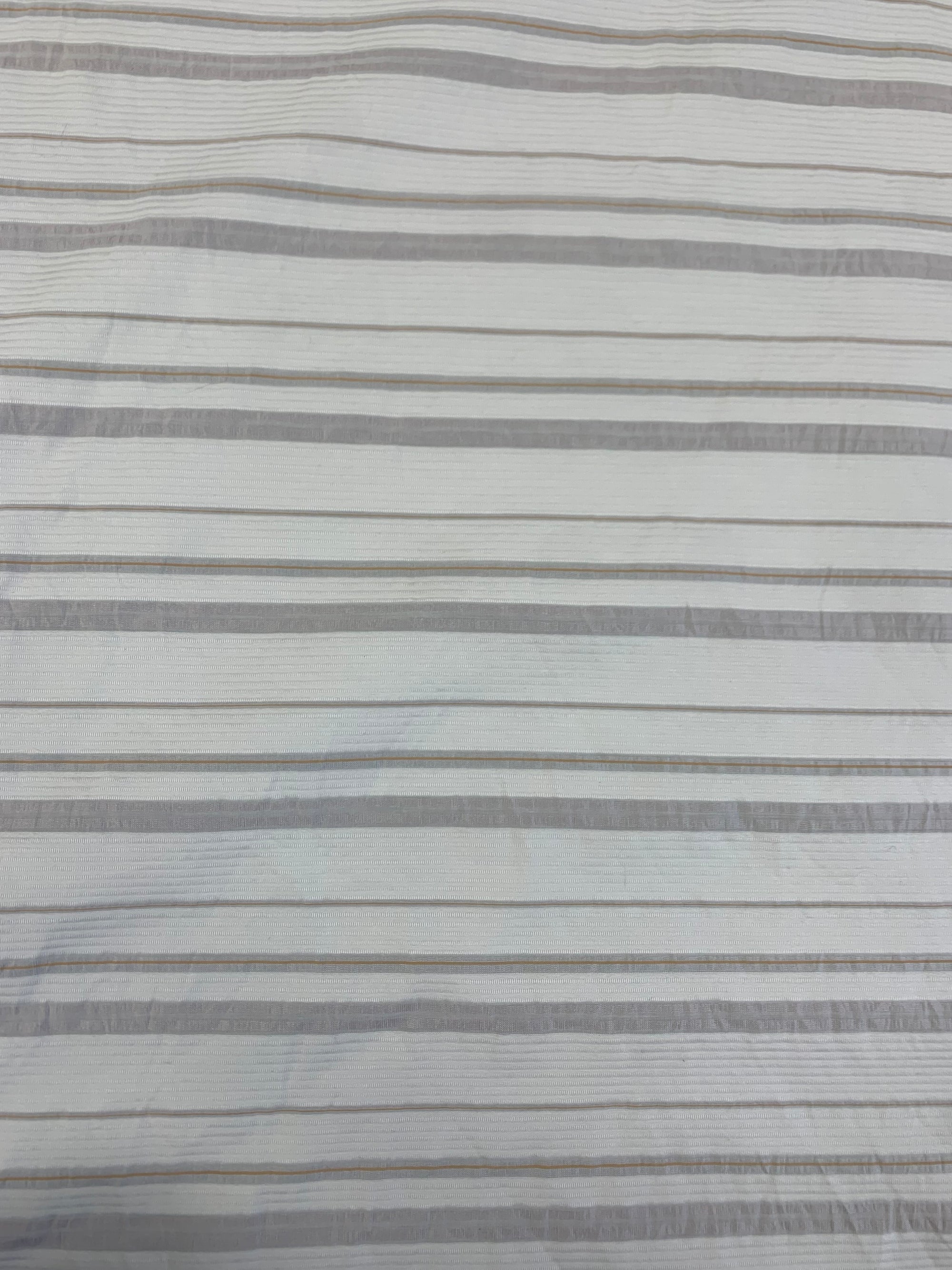 fabric is cotton poly blend with horizonal stripes of white, light pink and orange